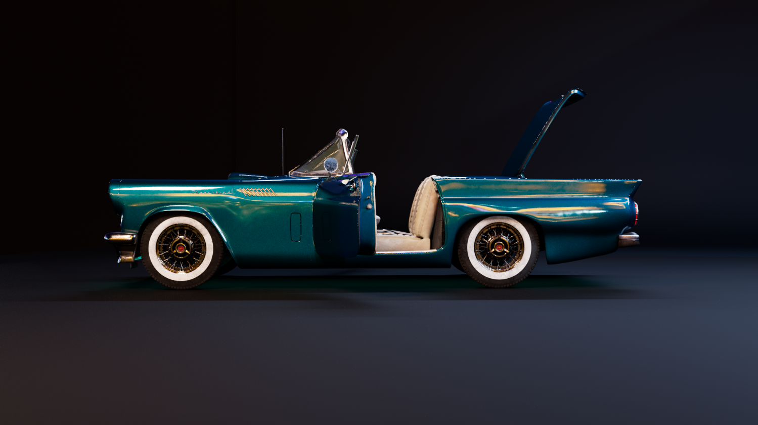 Side profile of the teal 1957 Thunderbird with the trunk lid raised